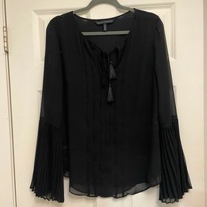 White House Black Market Sheer Black Long bell pleated sleeves.